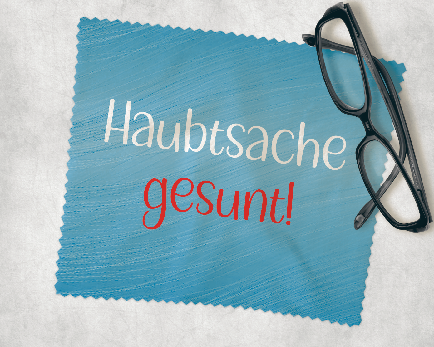 Brillenputztuch in blau mit Aufdruck in weiß und rot "Haubtsache gesunt!" Extra falsch geschrieben