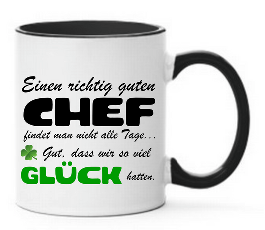 Schwarze Tasse mit Spruch Einen richtig guten Chef findet man nicht alle Tage... Gut, dass wir so viel Glück hatten. Glück und Kleeblatt in grün