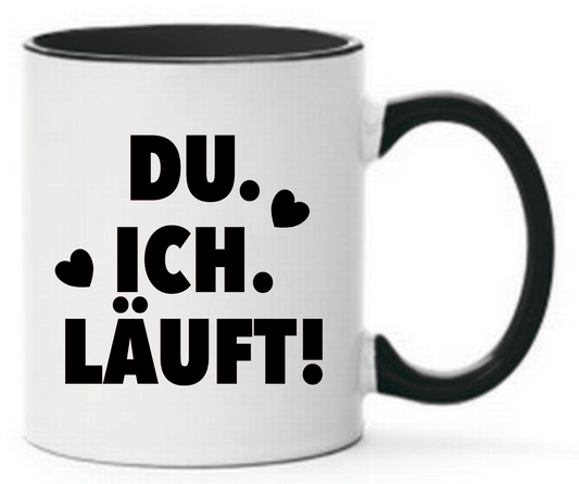 Schwarze Tasse mit Spruch Du. Ich. Läuft! mit schwarzen Herzen